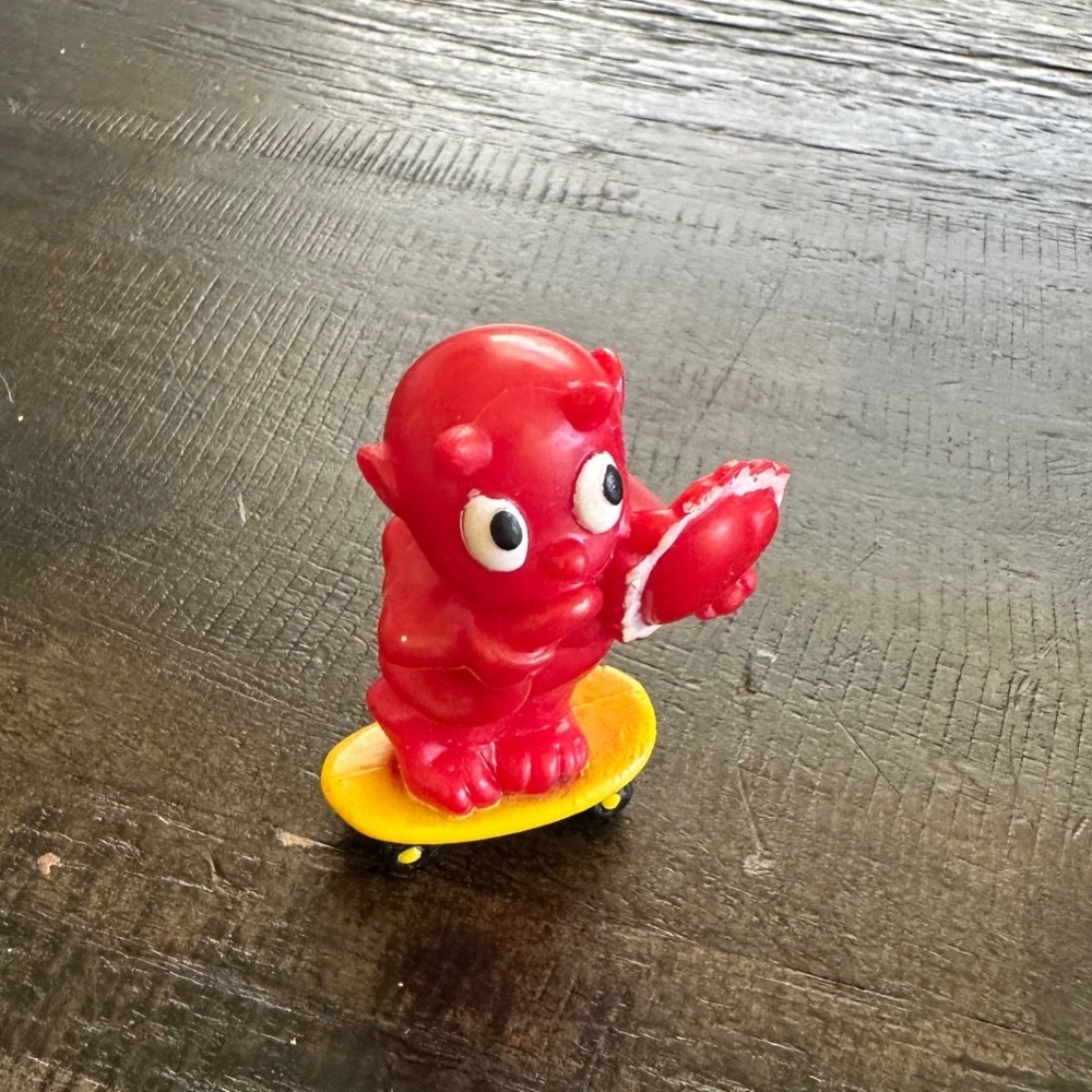 Vintage Red Devil on Yellow Skateboard Plastic Figurine Novelty Toy 2.25 Inch